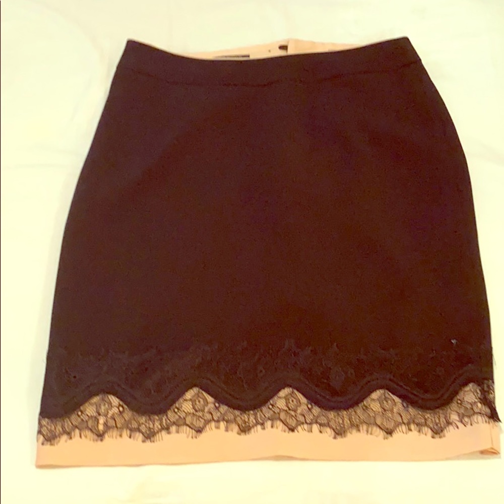 Stylish black skirt lace bottom with pink underlay